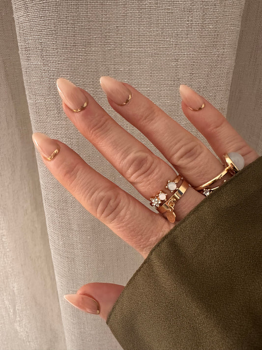 Golden Edge - Nude Almond Nails with Gold Trim